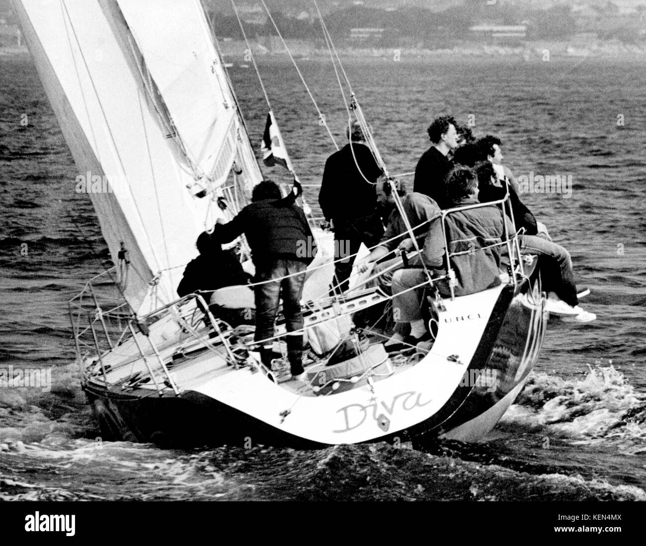 AJAXNETPHOTO. 10TH AUGUST,1983. PLYMOUTH, ENGLAND. - FASTNET RACE - FRENCH ADMIRAL'S CUP TEAM YACHT DIVA HEADS FOR THE BREAKWATER LIGHT AS IT NEARS THE FINISH LINE.  PHOTO:JONATHAN EASTLAND/AJAX REF:FASTNET 83 2 Stock Photo