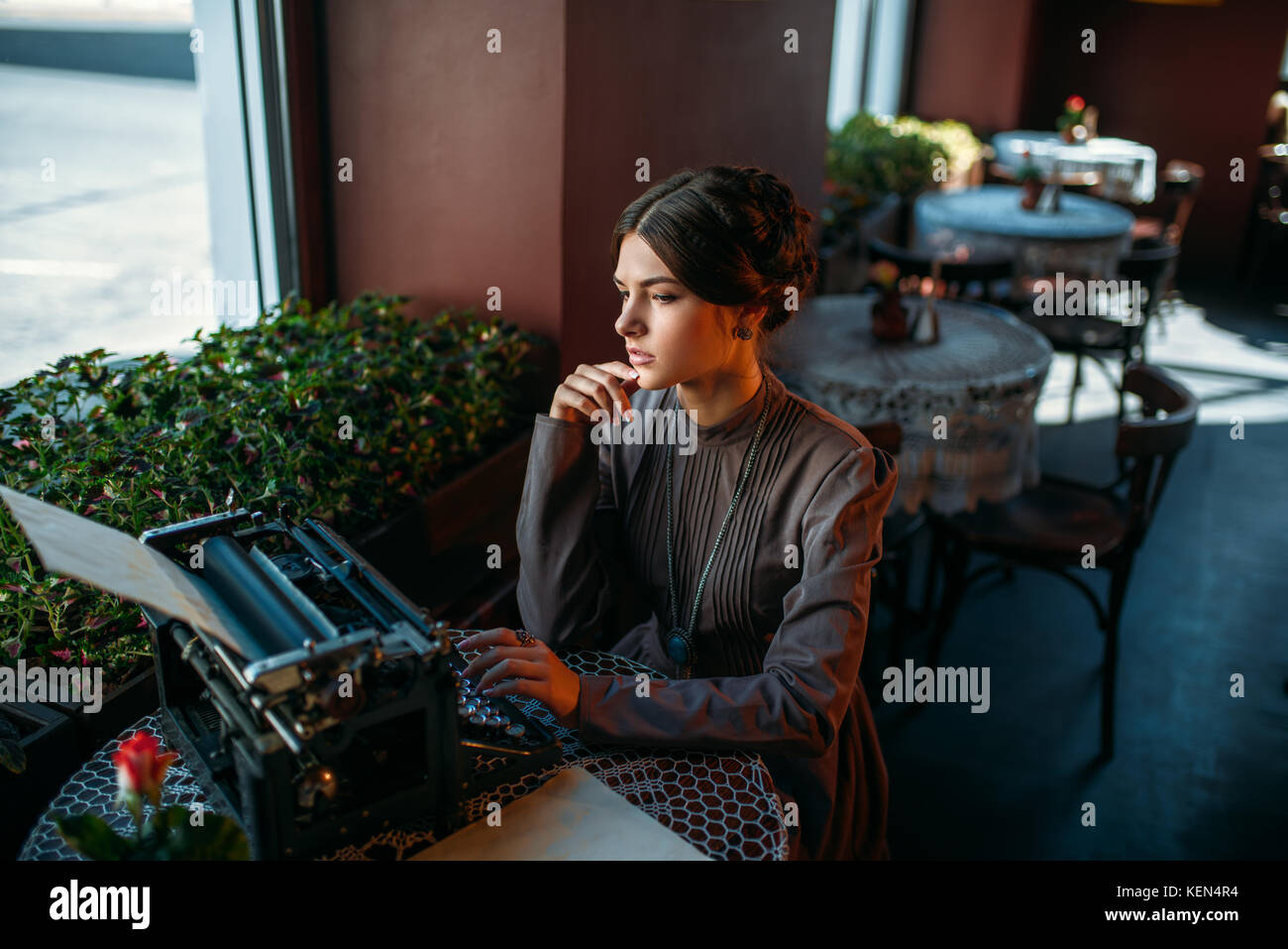 Portrait of beautiful young woman in cafe Stock Photo - Alamy