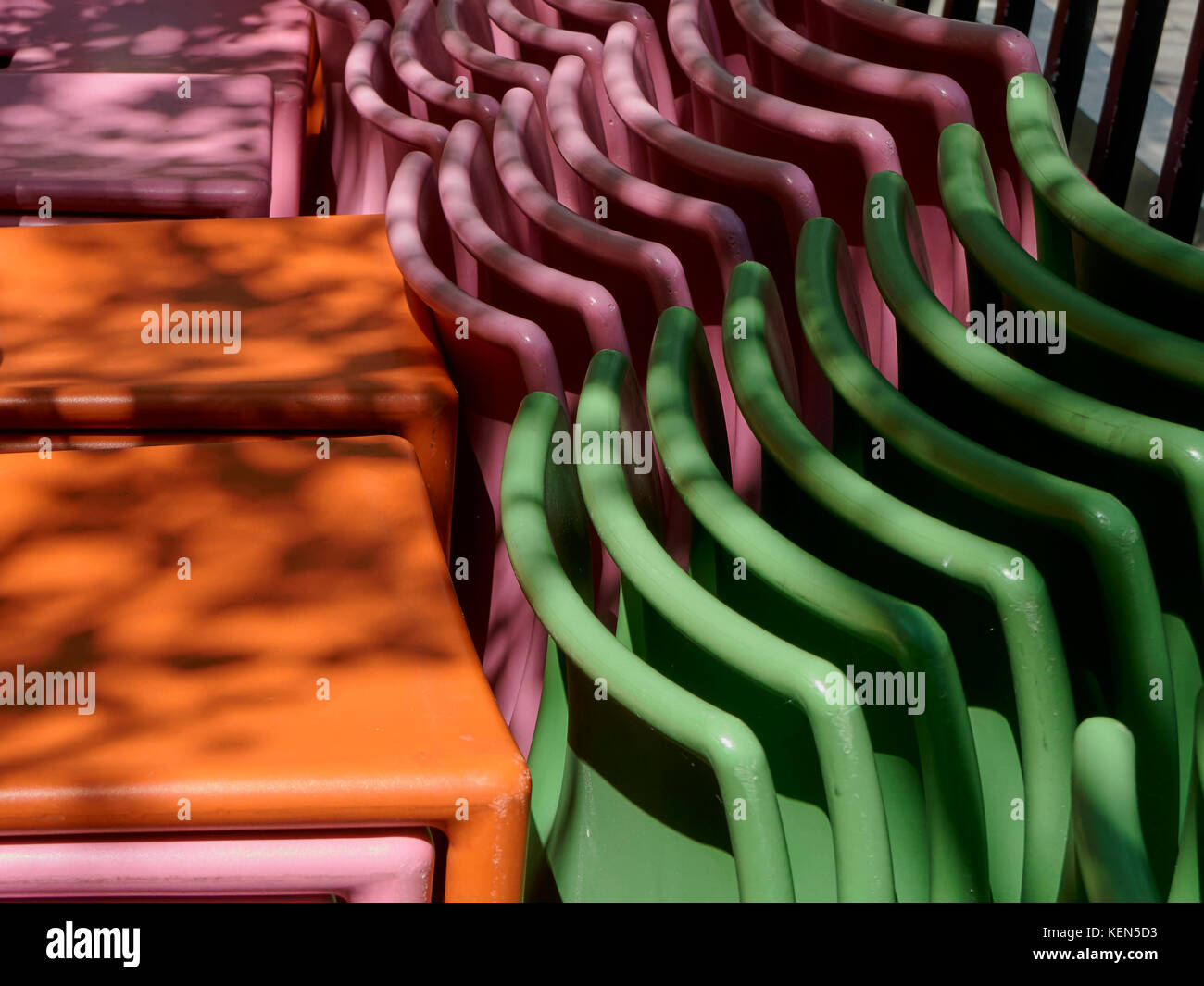 Stacked colorful chairs Stock Photo