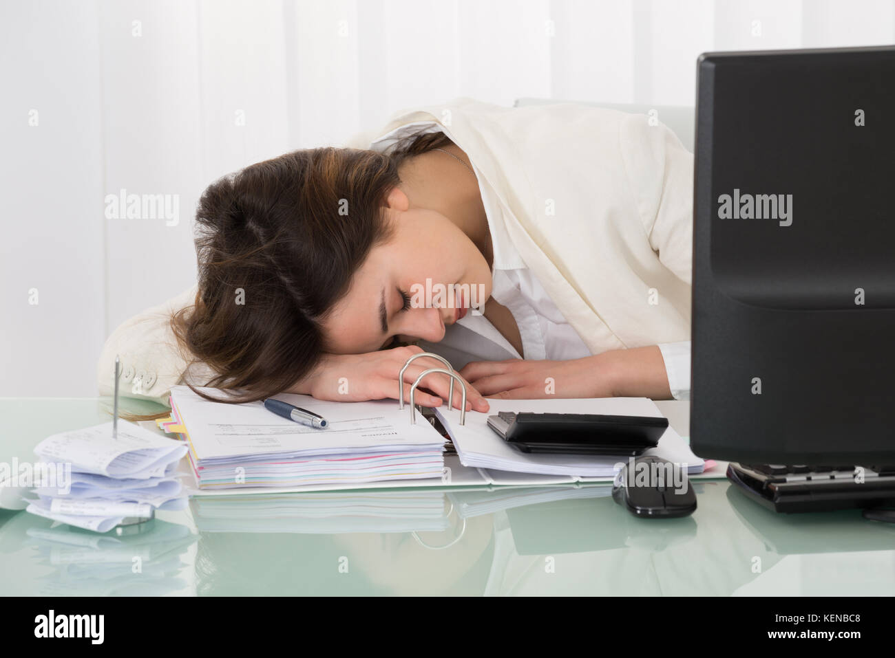 Photo Of Exhausted Young Businesswoman Sleeping On Desk Stock Photo - Alamy