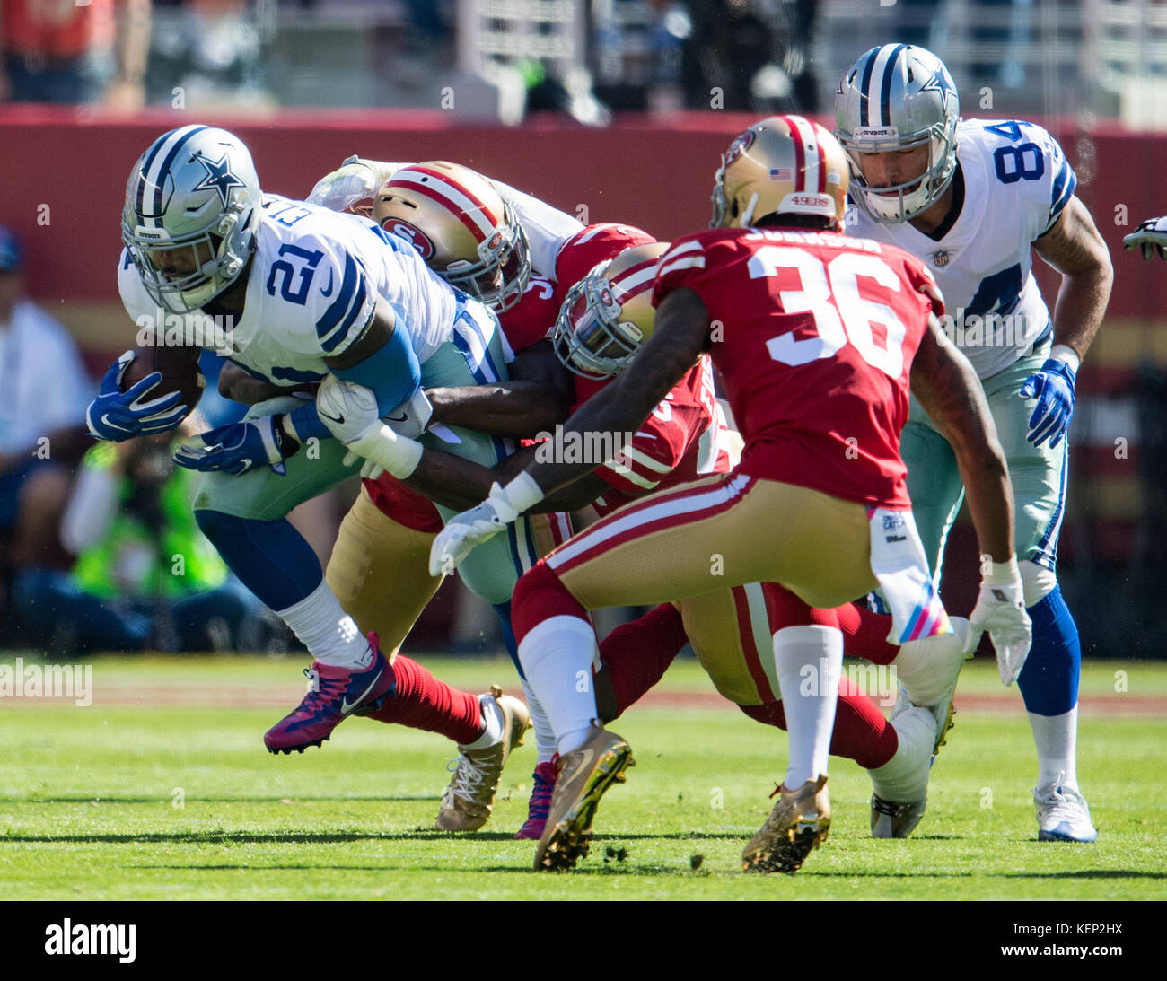 Santa Clara, California, USA. 22nd Oct, 2017. Dallas Cowboys running back Ezekiel Elliott (21) breaks a tackle, during a NFL game between the Dallas Cowboys and the San Francisco 49ers at the Levi's Stadium in Santa Clara, California. Valerie Shoaps/CSM/Alamy Live News Stock Photo