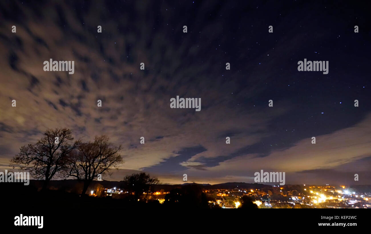 Ashbourne, Derbyshire, UK. 23rd October, 2017. UK Weather: night photograph over Ashbourne Derbyshire showing possible Orionid meteor shower caused by falling space debris from Halley's Comet in right hand side bottom section of photograph October 22nd 23rd 2017 Credit: Doug Blane/Alamy Live News Stock Photo