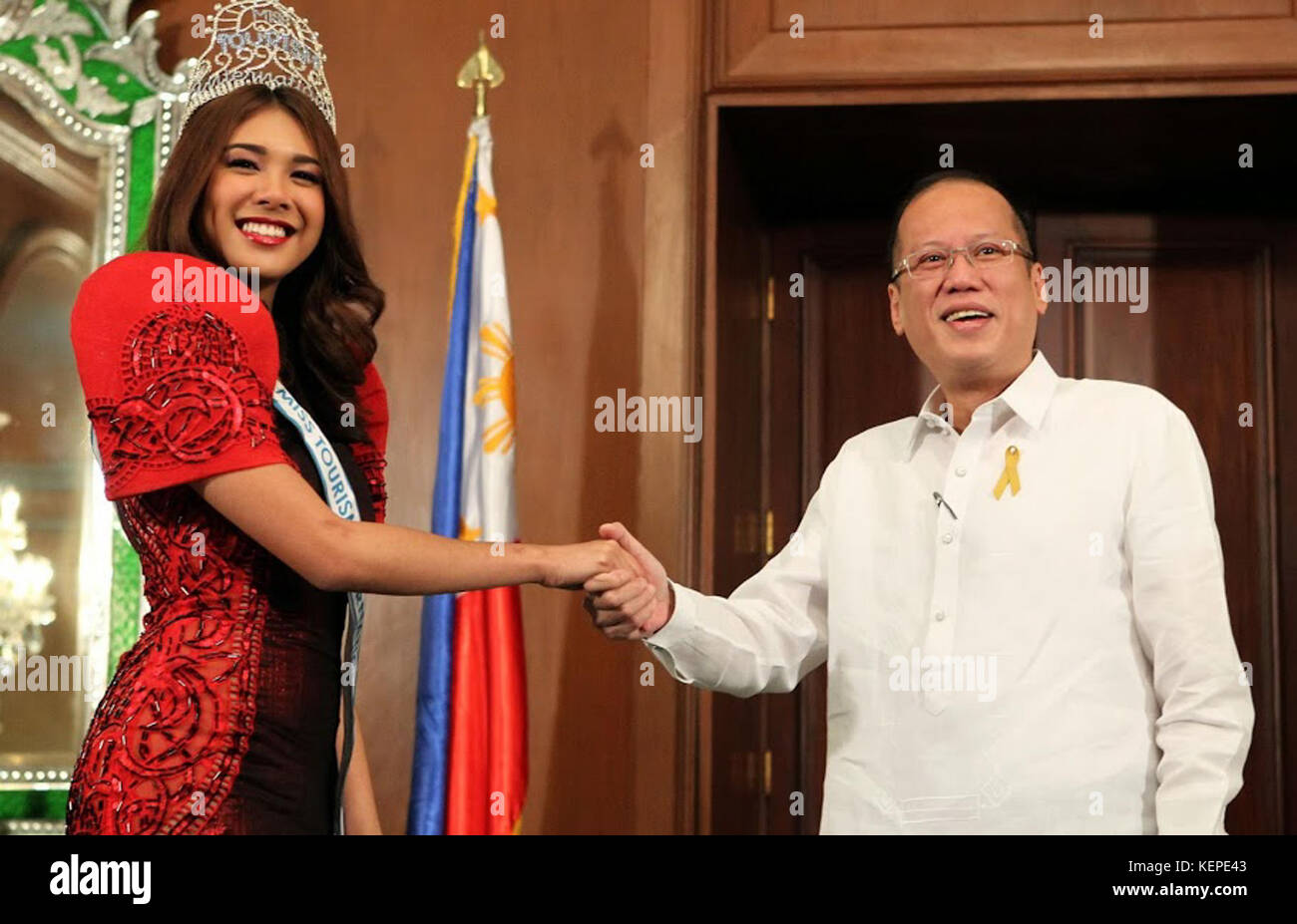 President Benigno S. Aquino III with Miss Tourism International 2013 Angeli Dione Gomez during her courtesy call on February 17, 2014 Stock Photo