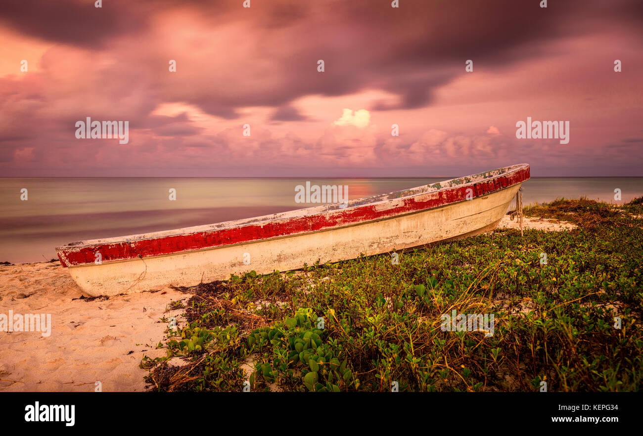 Old Fishing Boat sitting on the Beach Stock Photo - Alamy
