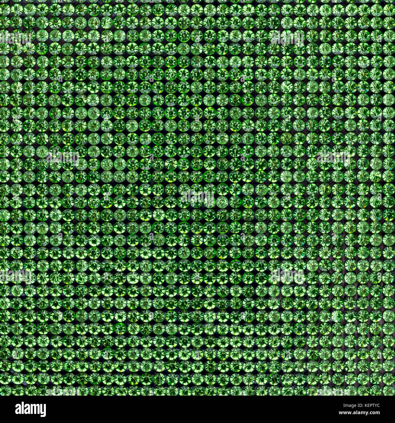 Canvas of green rhinestones. Background Stock Photo - Alamy