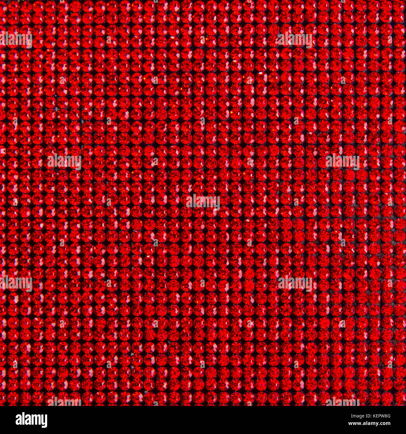 Canvas of red rhinestones. Background Stock Photo - Alamy