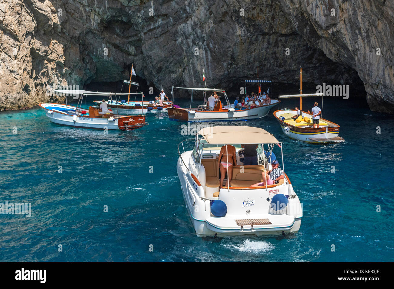 tourists on boat trips visit grotta verda on the island of capri, italy. Stock Photo