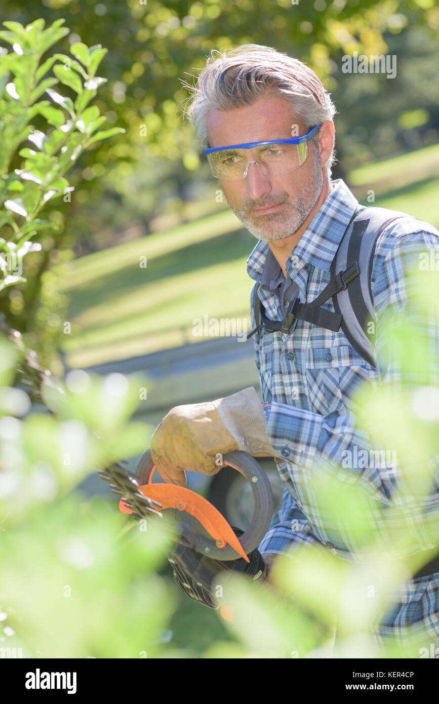 garden maintenance worker Stock Photo Alamy