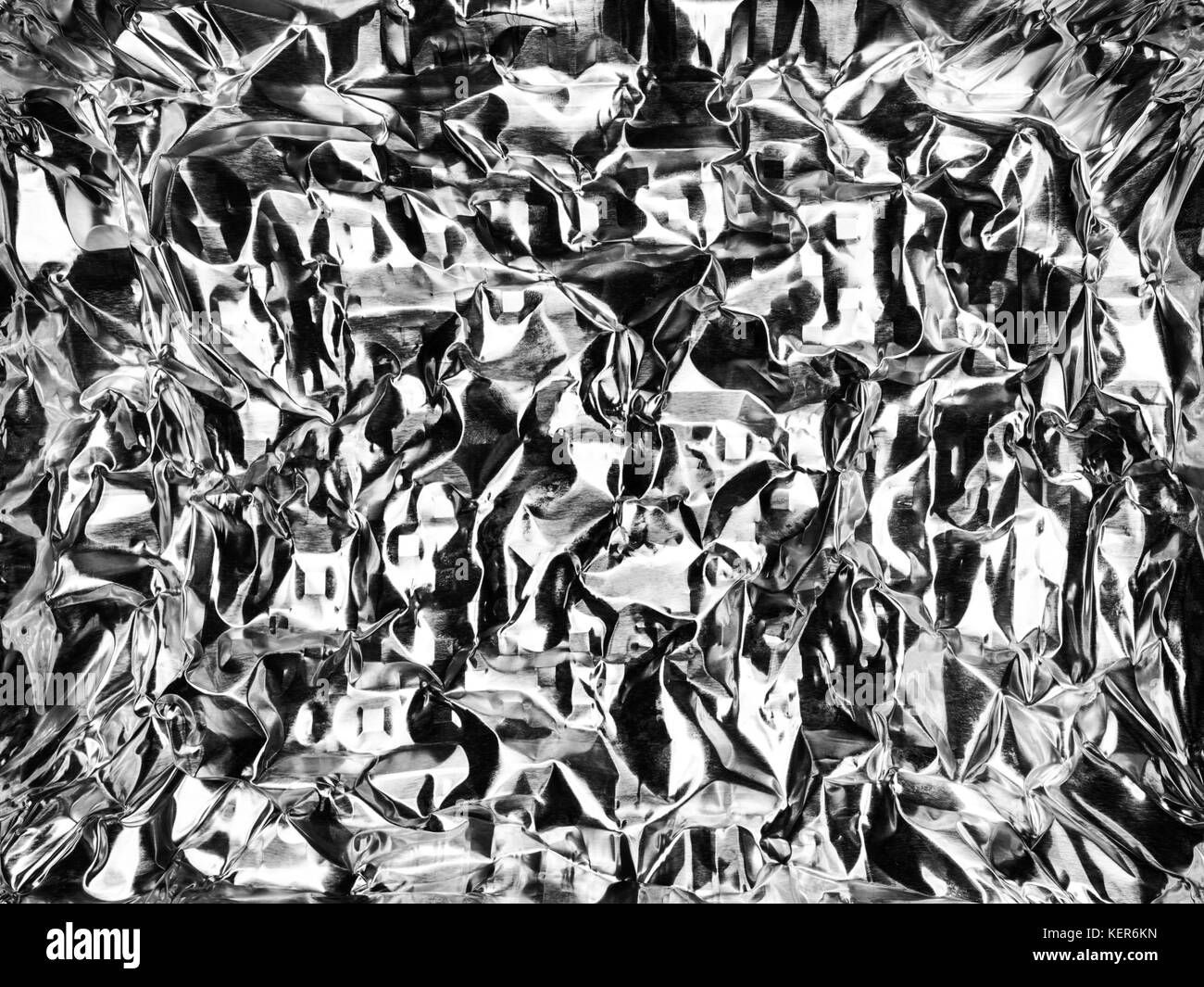 Abstract background of crumpled aluminum foil Stock Photo