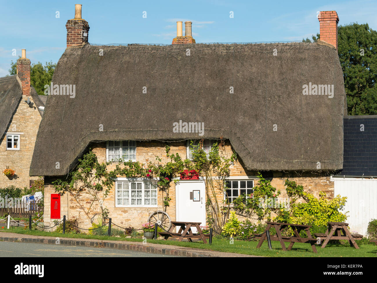Thatched Cottage Old Post Office In Village Of Weekley Stock