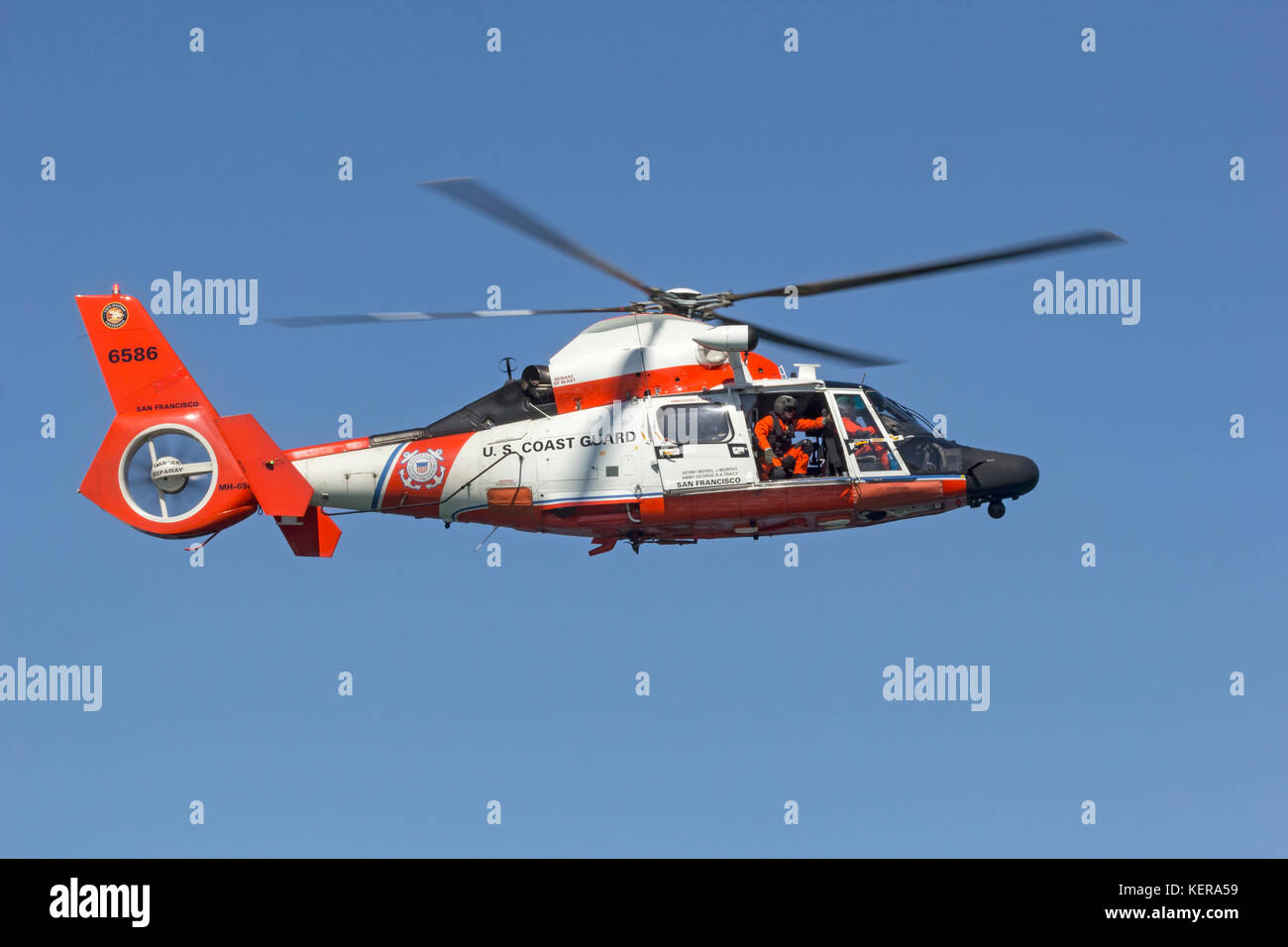 Coast Guard MH-65 Dolphin helicopter from Air Station San Francisco in flight. Stock Photo