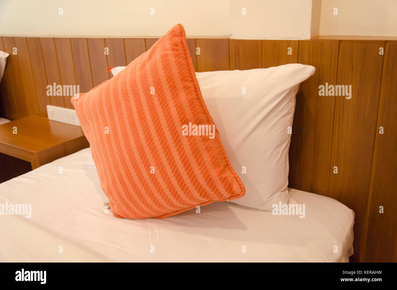 Comfortable beds and pillows in the bedroom, a luxurious interior Stock