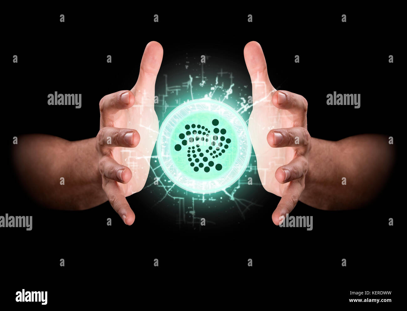 A pair of male hands reaching through the dark grasping at an iota hologram Stock Photo