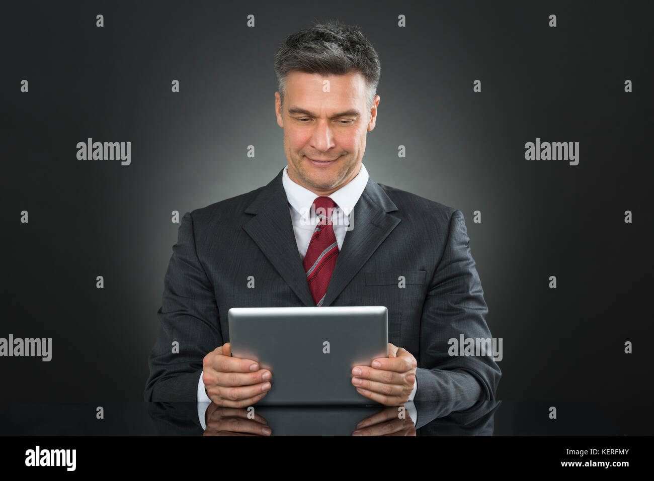 Portrait Of A Businessman Using Digital Tablet Stock Photo - Alamy