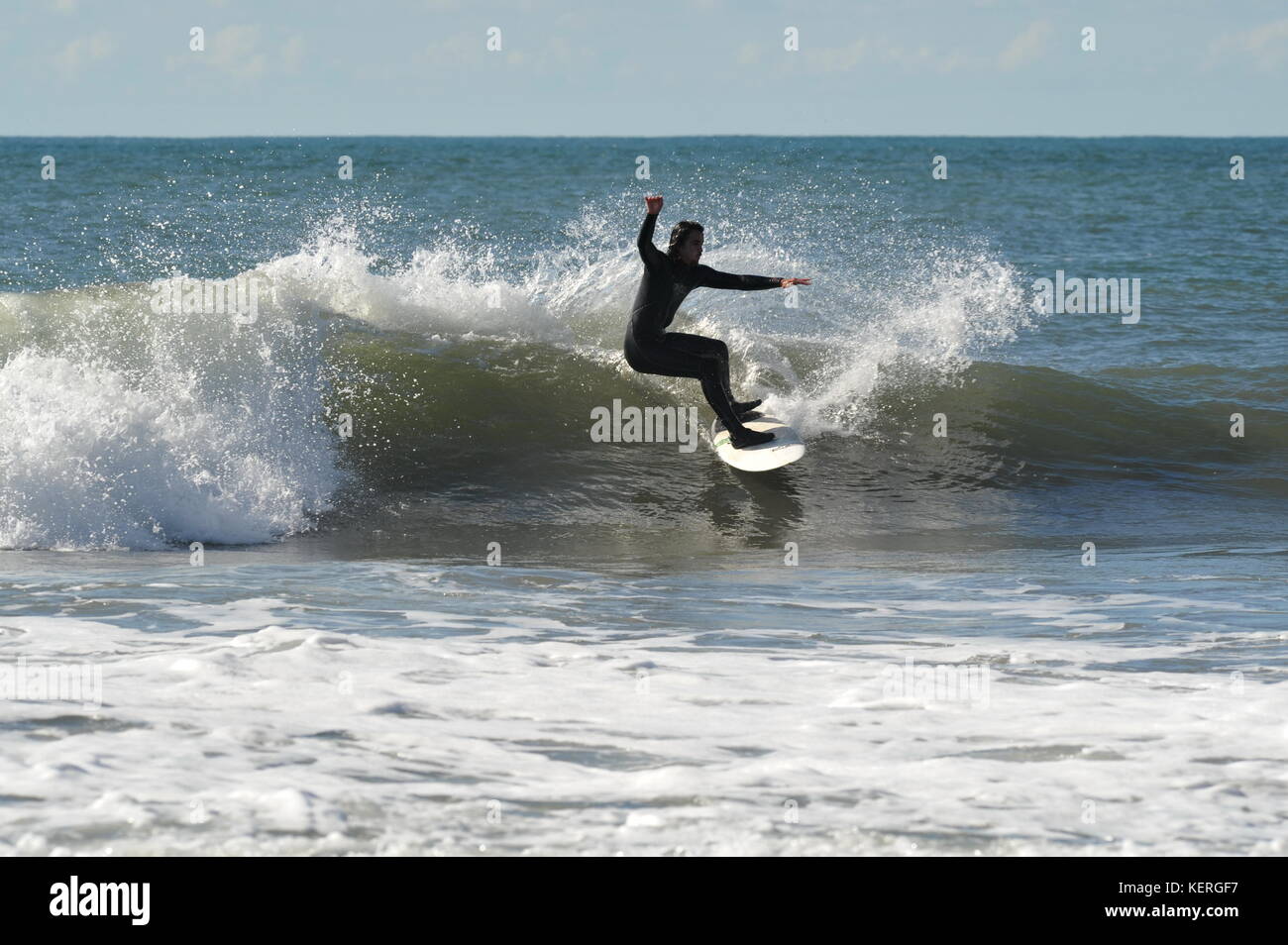 surfing the ultimate all round fitness sport Stock Photo