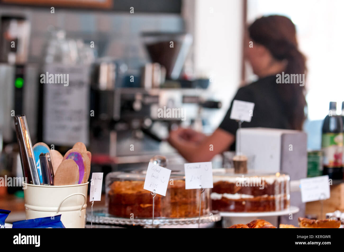 Barista making coffee in an independent coffee shop Stock Photo Alamy