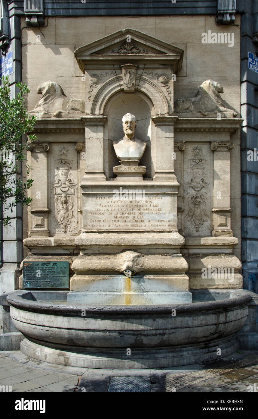 Brussels, Belgium. Fountain (1888) in Place de la Bourse - bust of Auguste Orts (1814-80) belgian lawyer and Liberal politician Stock Photo