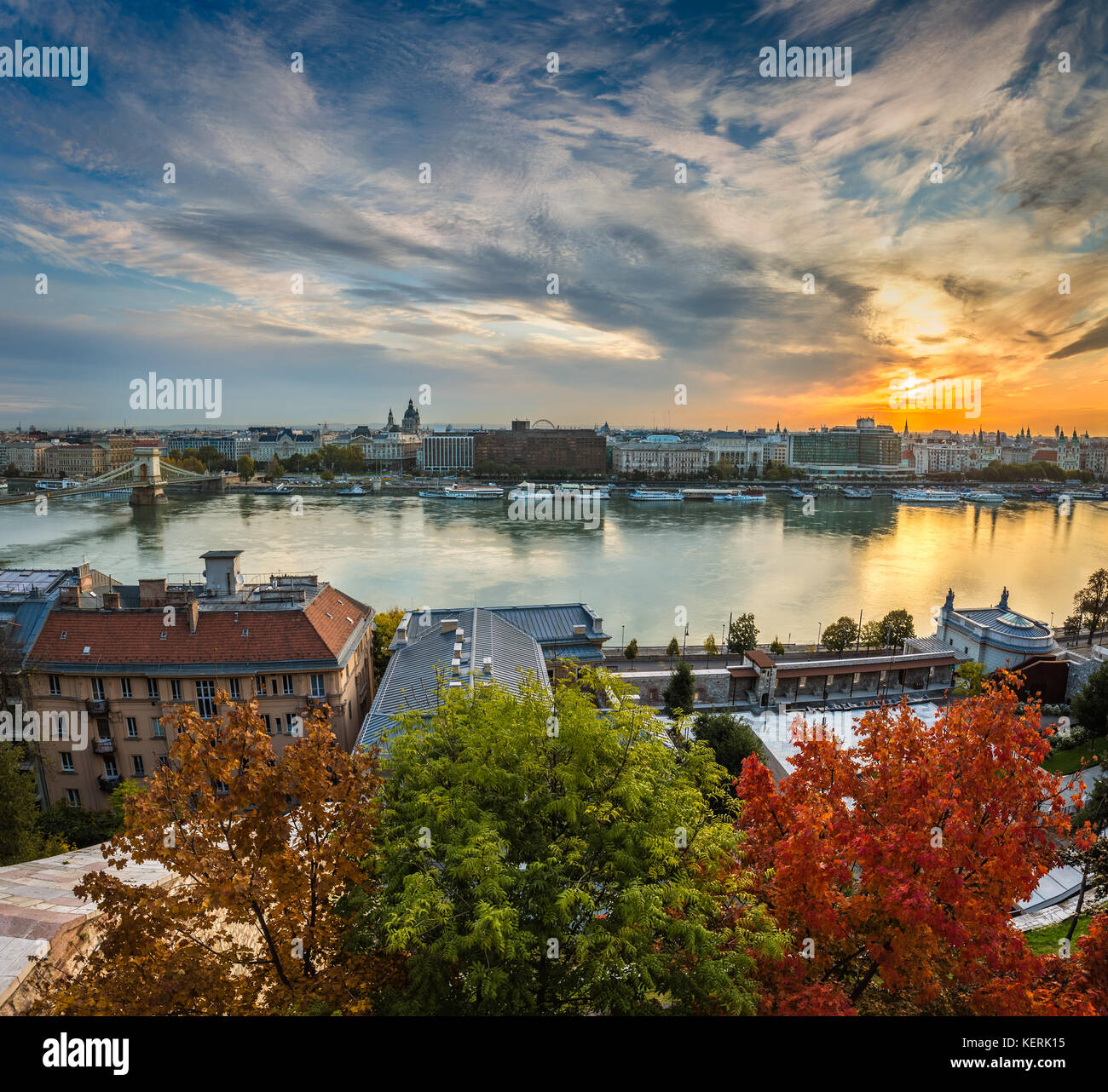 Budapest, Hungary - Autumn colors at the heart of Budapest at sunrise with Szechenyi Chain Bridge and other landmarks Stock Photo