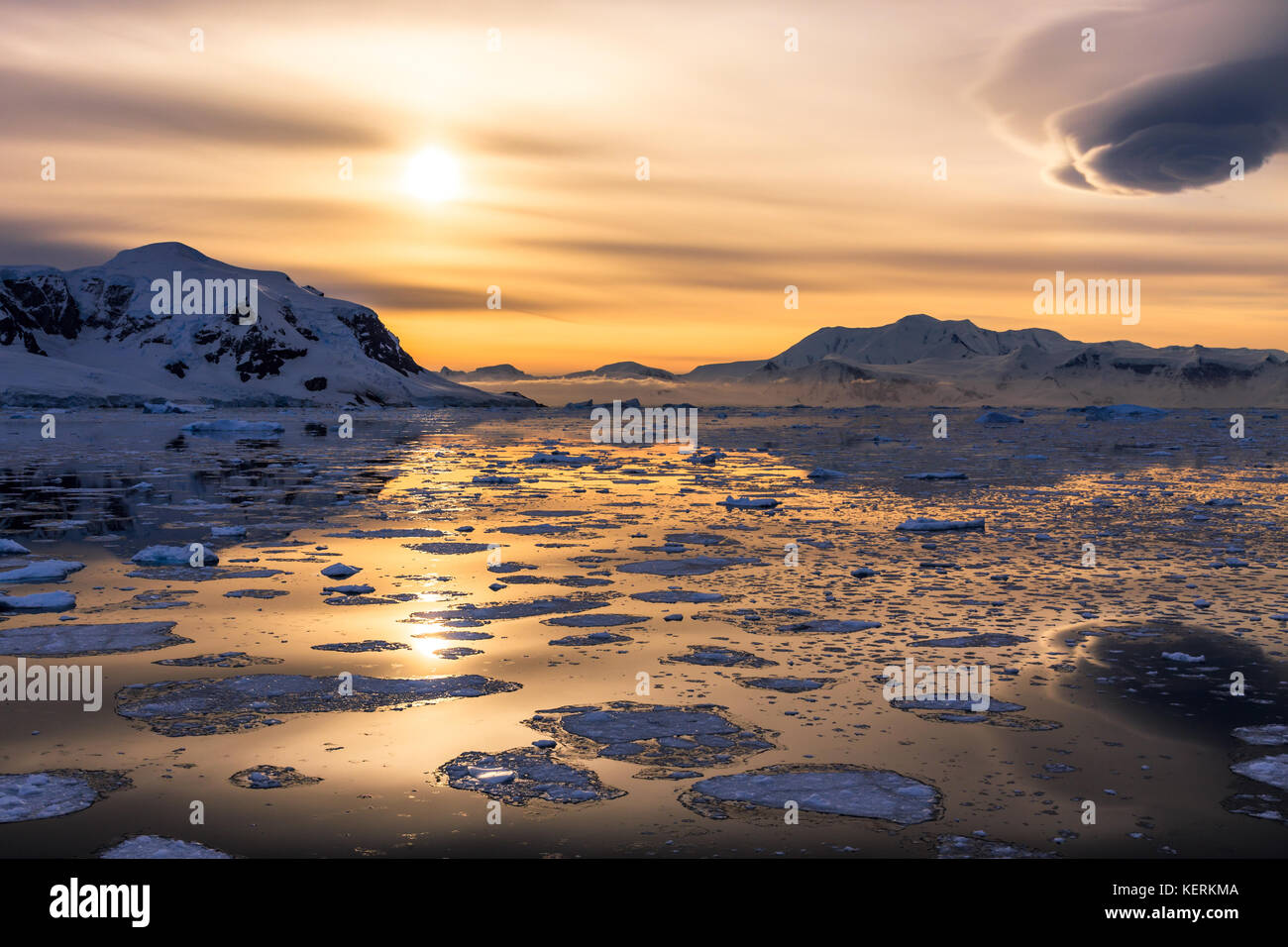 Sunset over the mountains with glaciers and drifting icebergs at Lemaire  Strait, Antarctica Stock Photo - Alamy, image size:1300x956