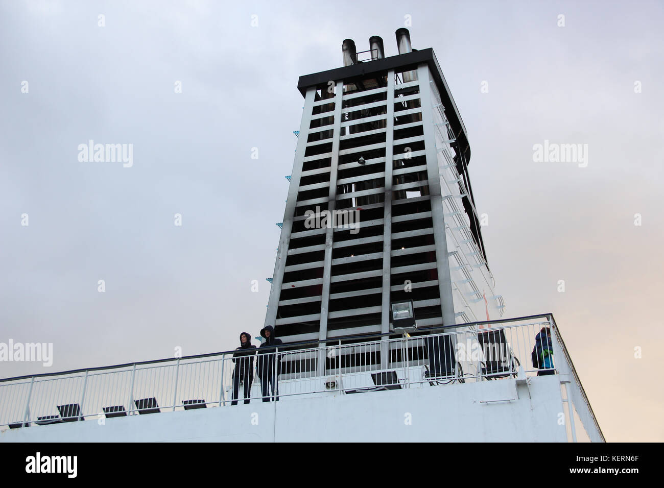 Aboard, chimney of a ferry or cruise ship, black smoke. Pollutes the ...