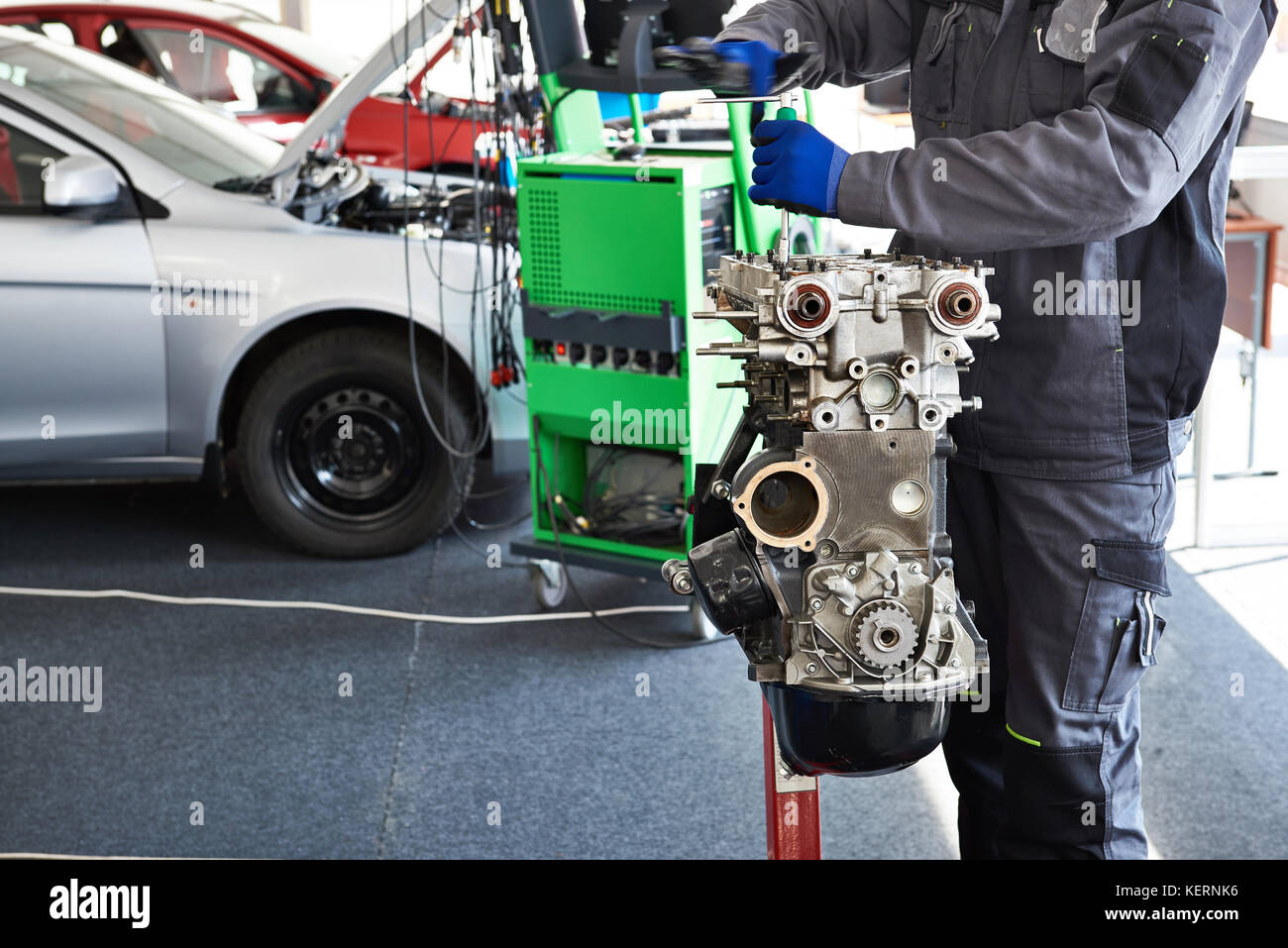 Repair of a car engine in a car workshop Stock Photo