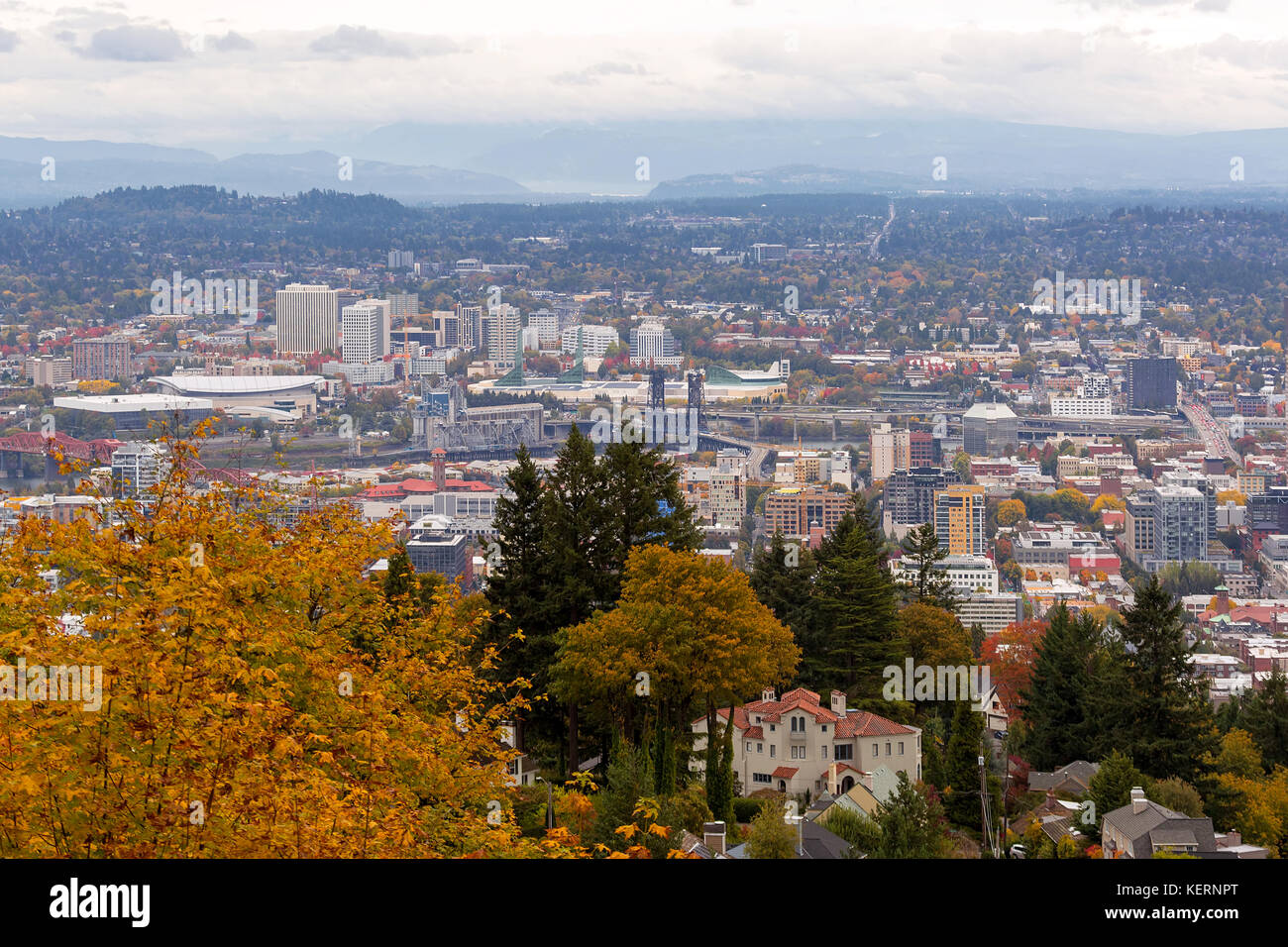 Northwest and Northeast Portland Oregon cityscape and bridges over Willamette River in Fall Season Stock Photo
