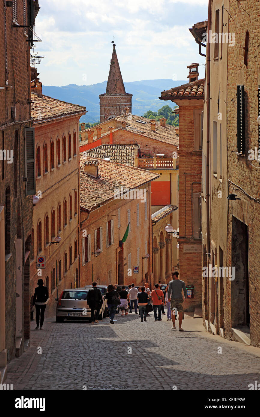 Narrow street in the center of the old town of Urbino, Marche, Italy Stock Photo