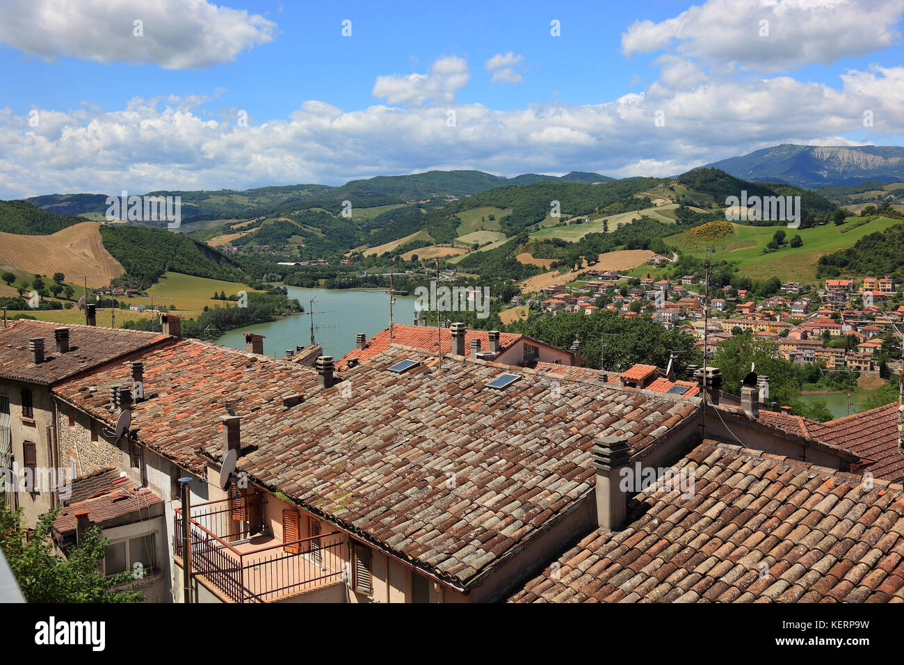 roofs of the old village of Sassocorvaro, with the view to Mercatale and river Foglia, Marche, Italy Stock Photo