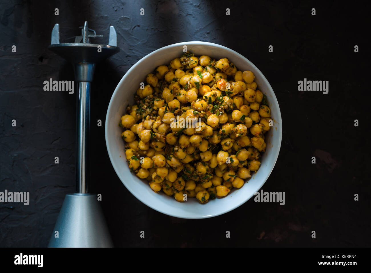 Chickpeas in a ceramic bowl and blender for falafel Stock Photo Alamy