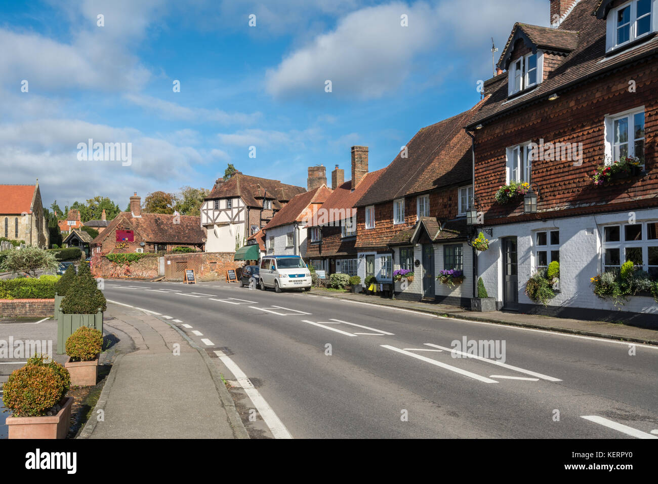 The Swan public house and cottages on the main street in Chiddingfold village in Surrey, UK Stock Photo