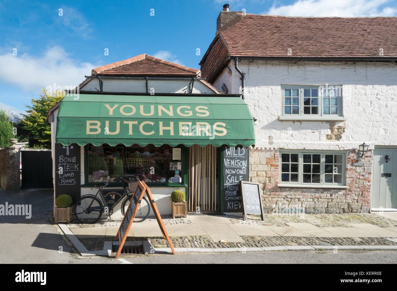 Cottages and butcher's shop in Chiddingfold village in Surrey, UK Stock Photo