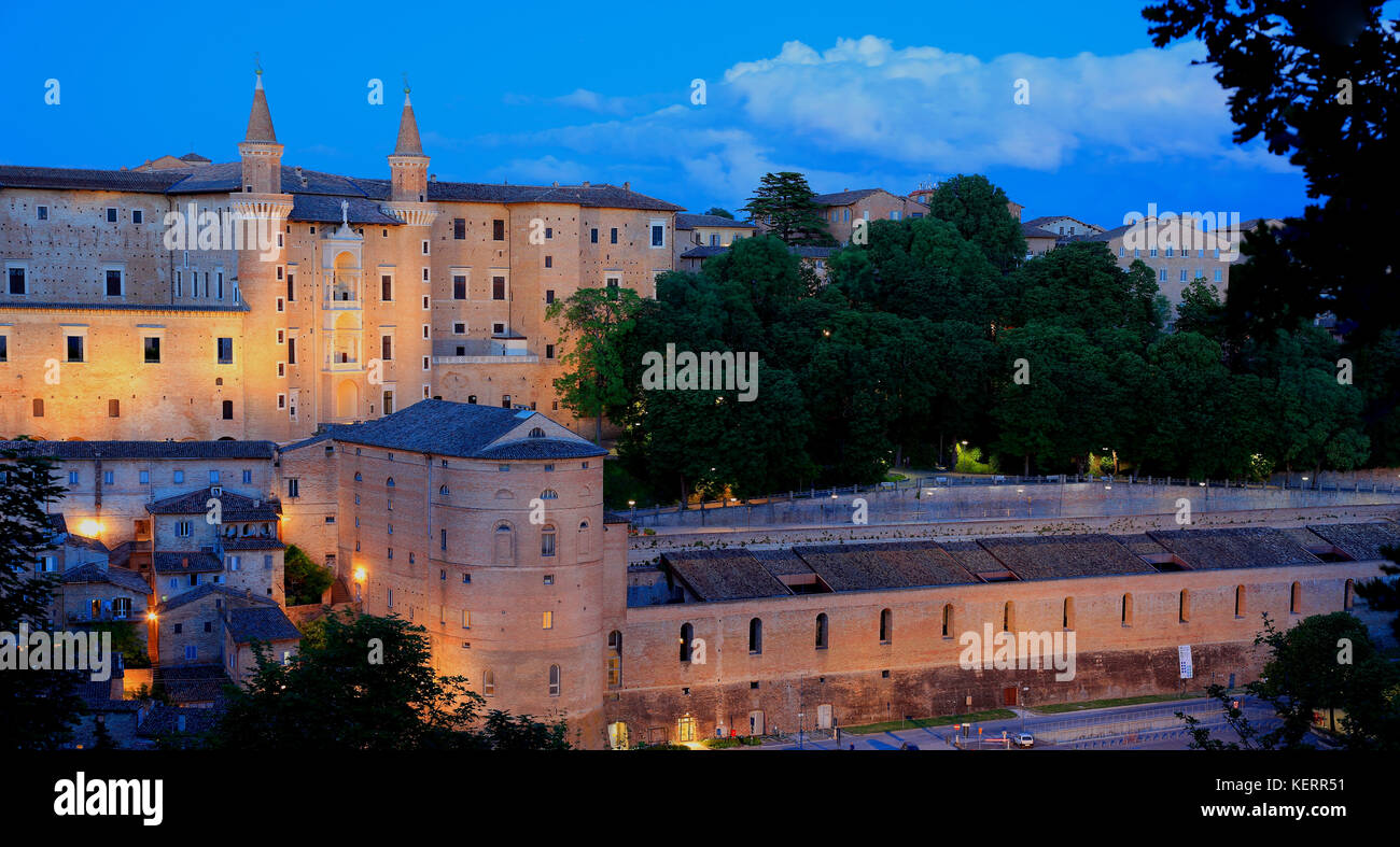 View of Urbino in the evening, with the Ducal Palace, Palazzo Ducale and the Cathedral, Marche, Italy Stock Photo