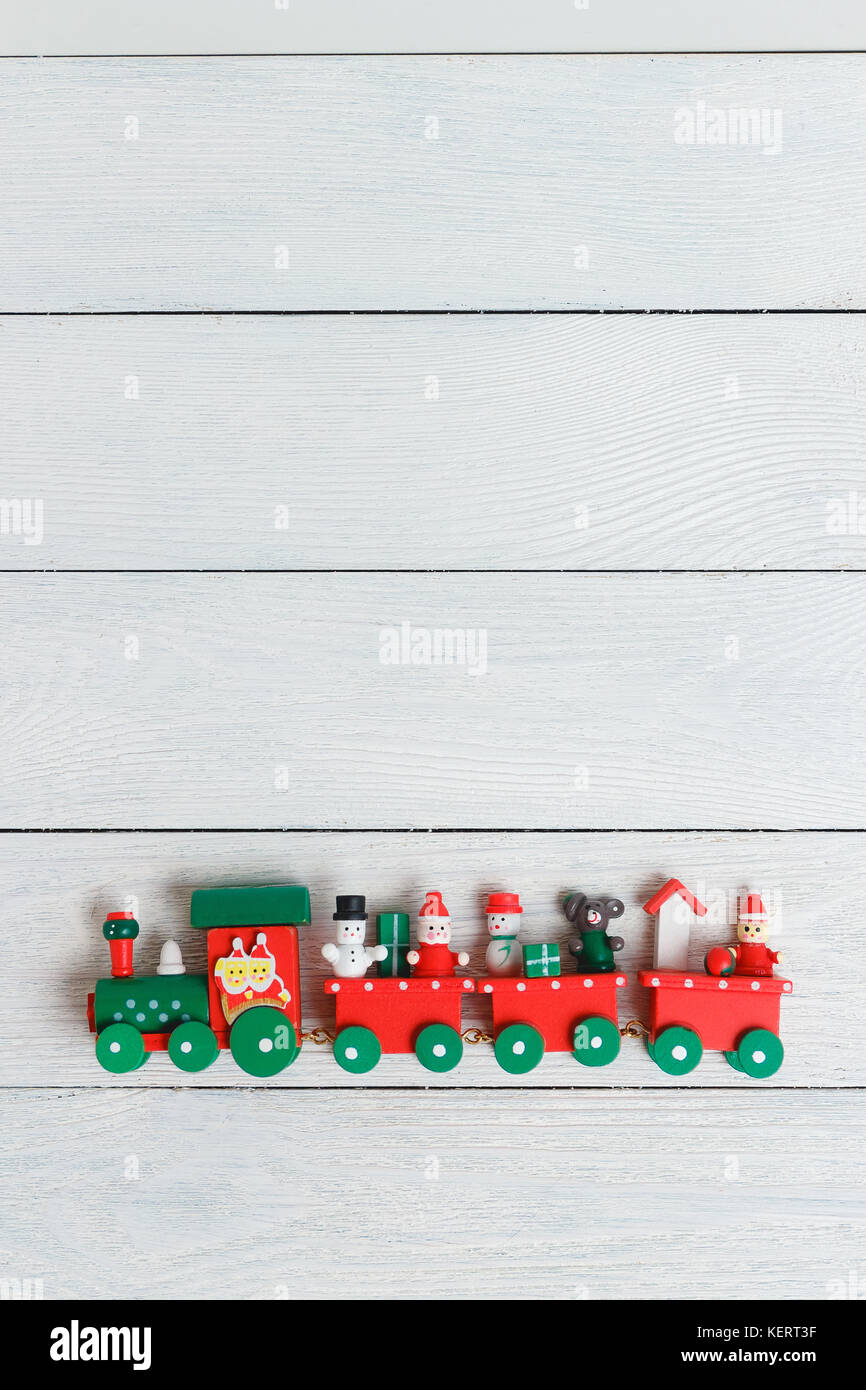 A colorful holiday Christmas train over a white background Stock Photo