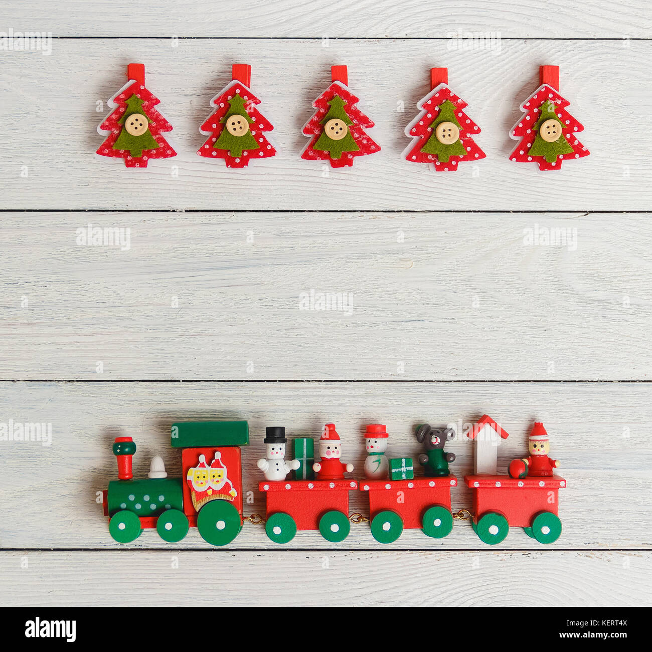 Christmas composition with fir tree clothespin, train. Top view, flat lay. Stock Photo