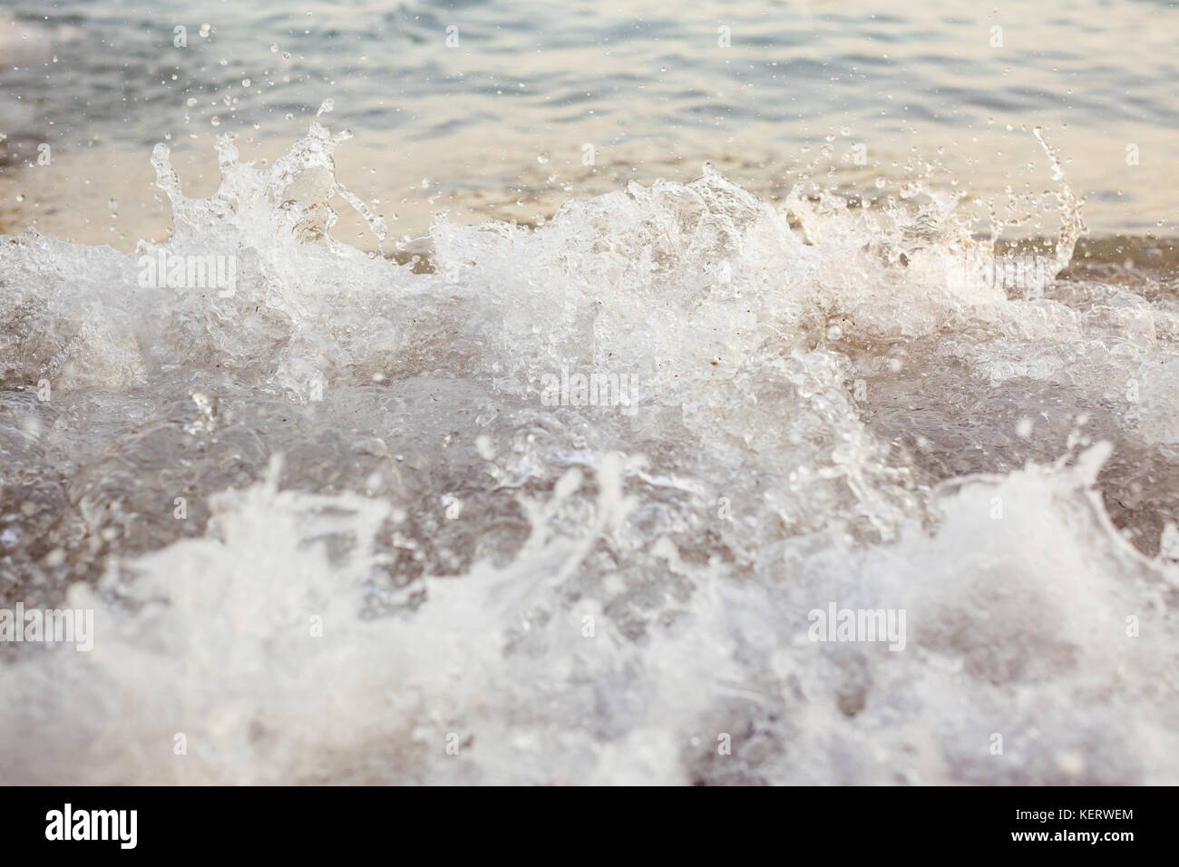 waves break against the rocks Stock Photo - Alamy