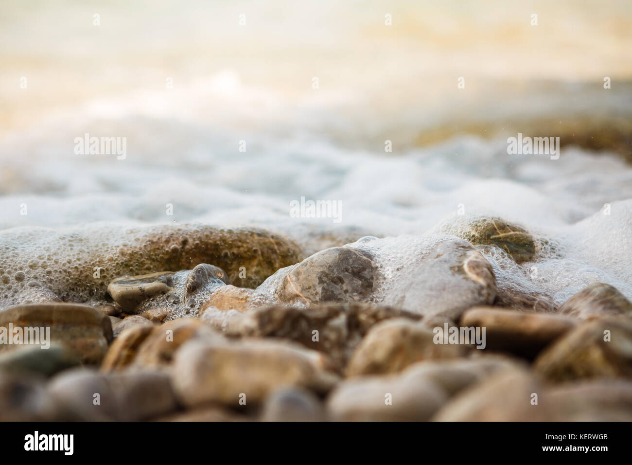 waves break against the rocks Stock Photo - Alamy