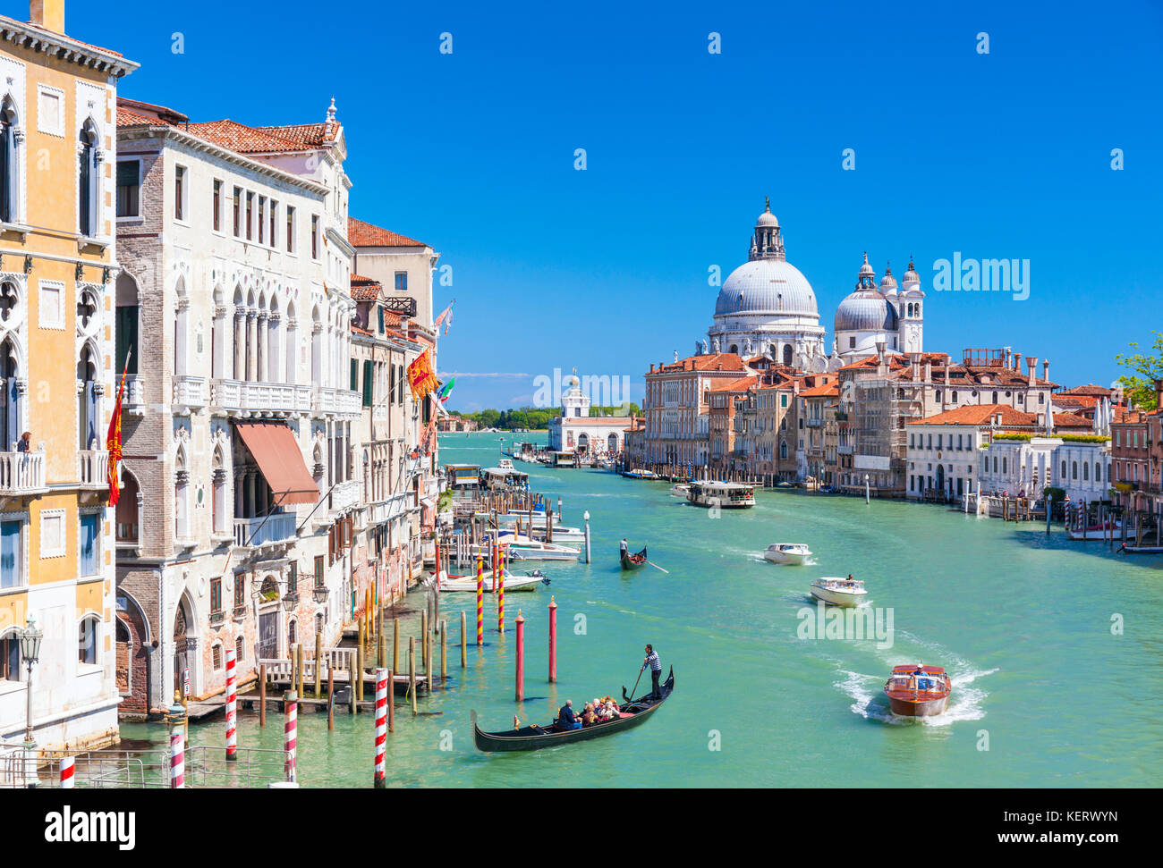Venice italy venice Vaporettos actv water taxi or water bus and other small motor boats in Venice on the Grand Canal Venice Italy EU Europe Stock Photo