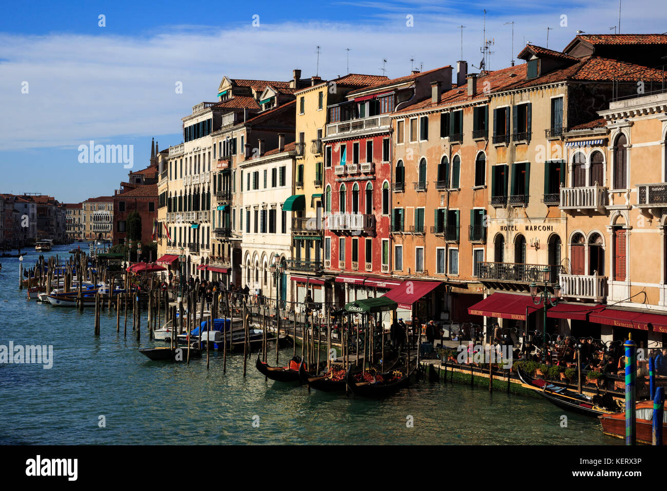 View of buildings, gondolas, boats and the Grand Canal, Canal Grande, from Rialto Bridge, Venice, Veneto, Italy Stock Photo