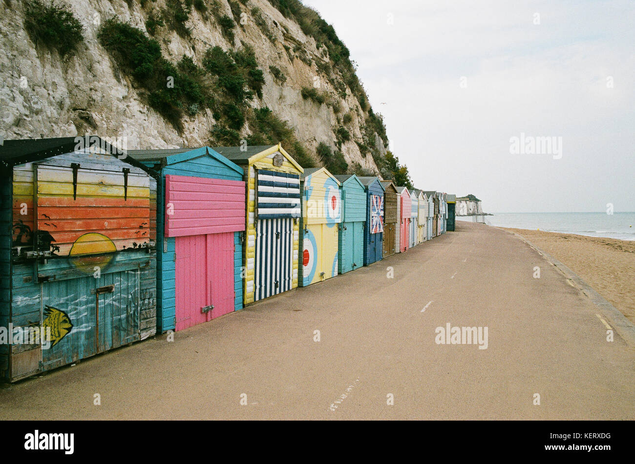 Row of beach huts on the East Kent coast, near Broadstairs, Thanet, UK Stock Photo