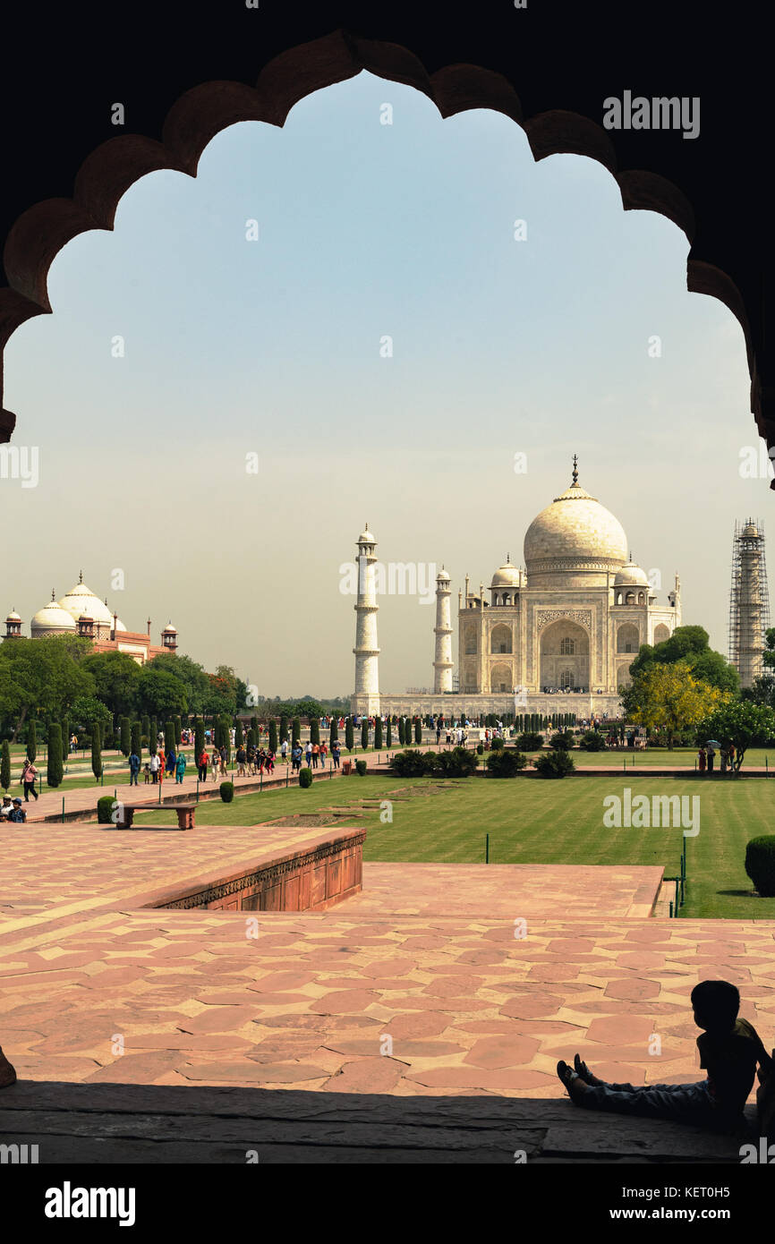 Young indian kid admiring the Taj Mahal mausoleum in Agra, Uttar Pradesh, India. Stock Photo