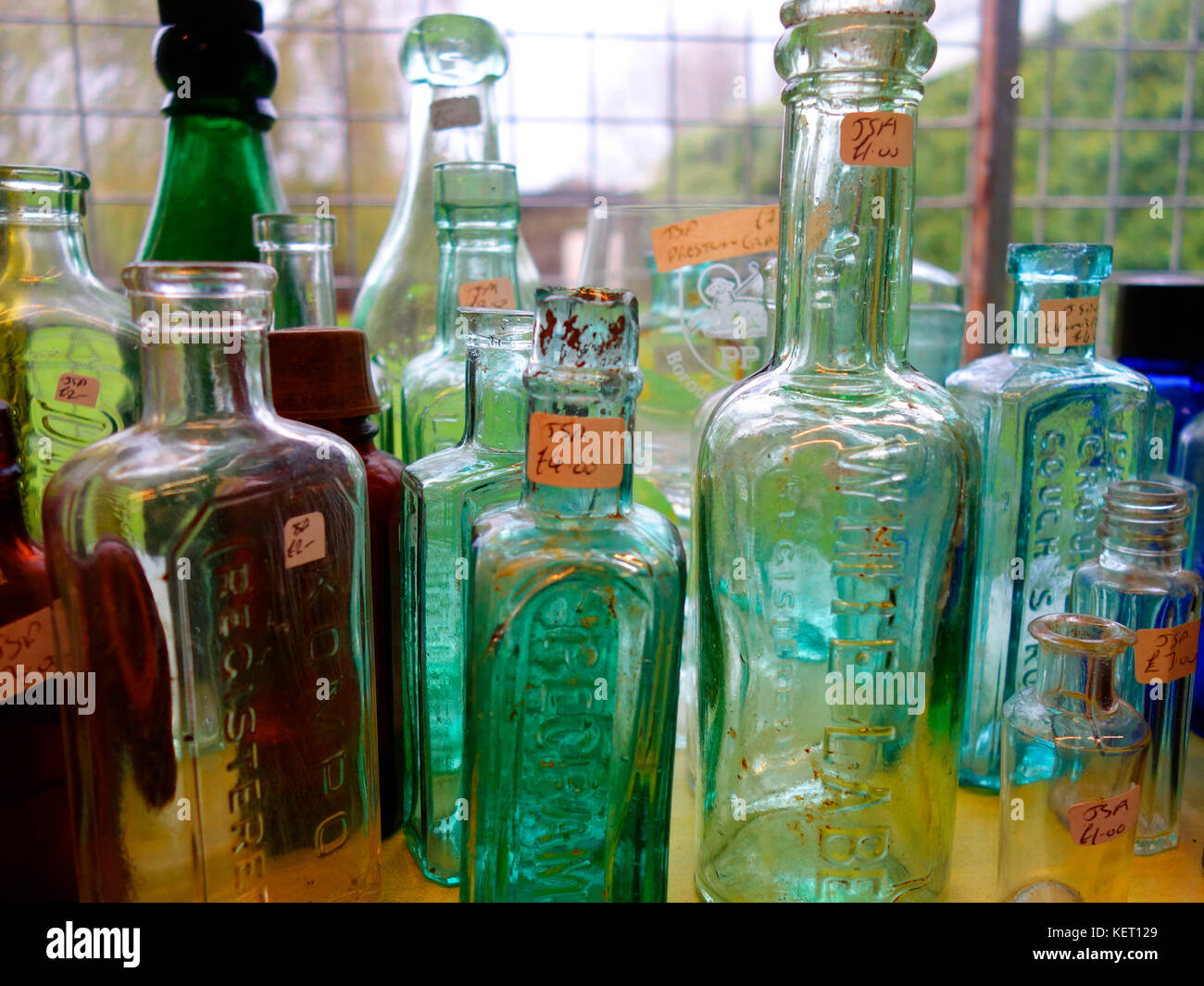 A collection of vintage glass medicine bottles Stock Photo