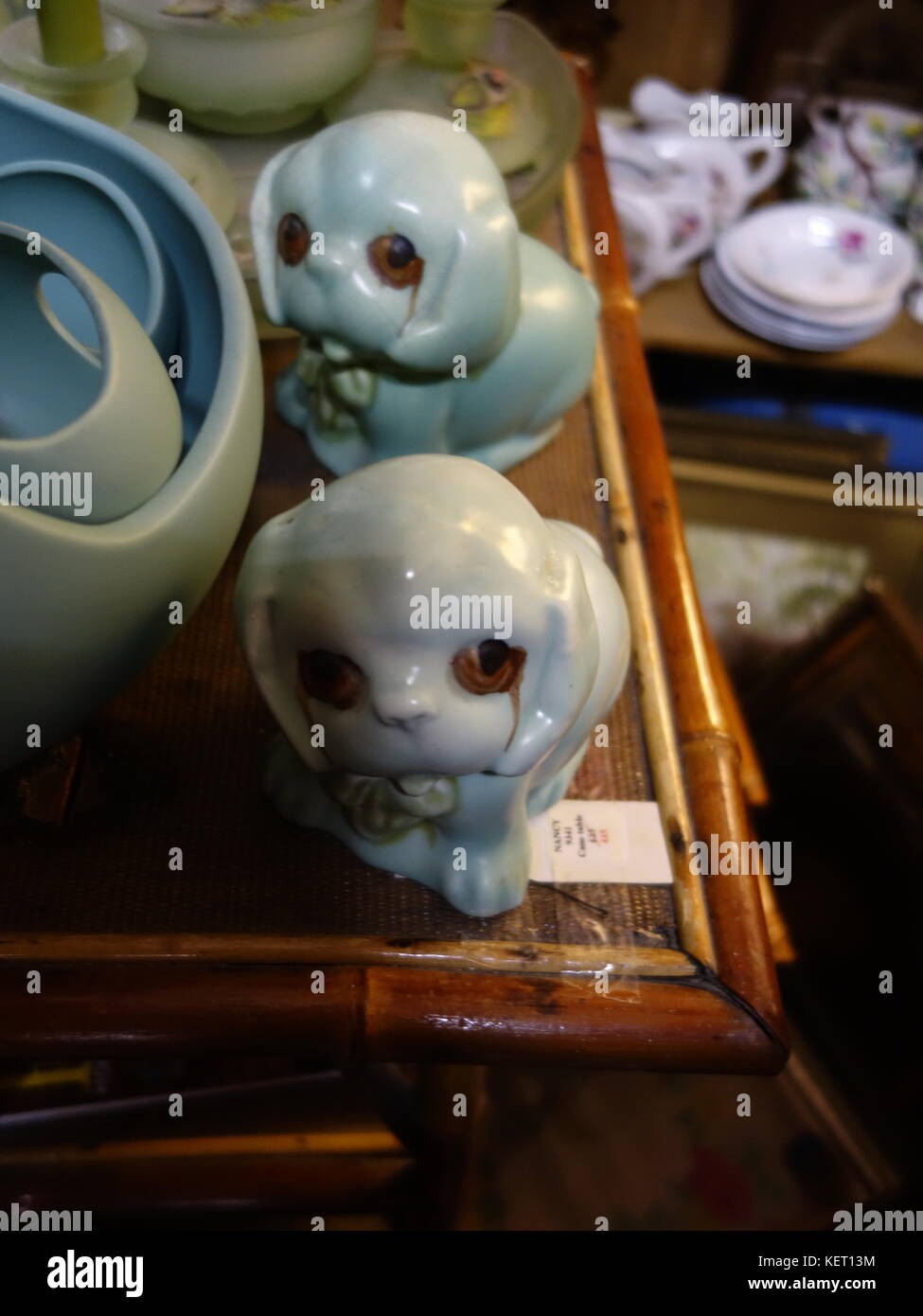 a couple of cute ceramic dogs from an old antique shop Stock Photo