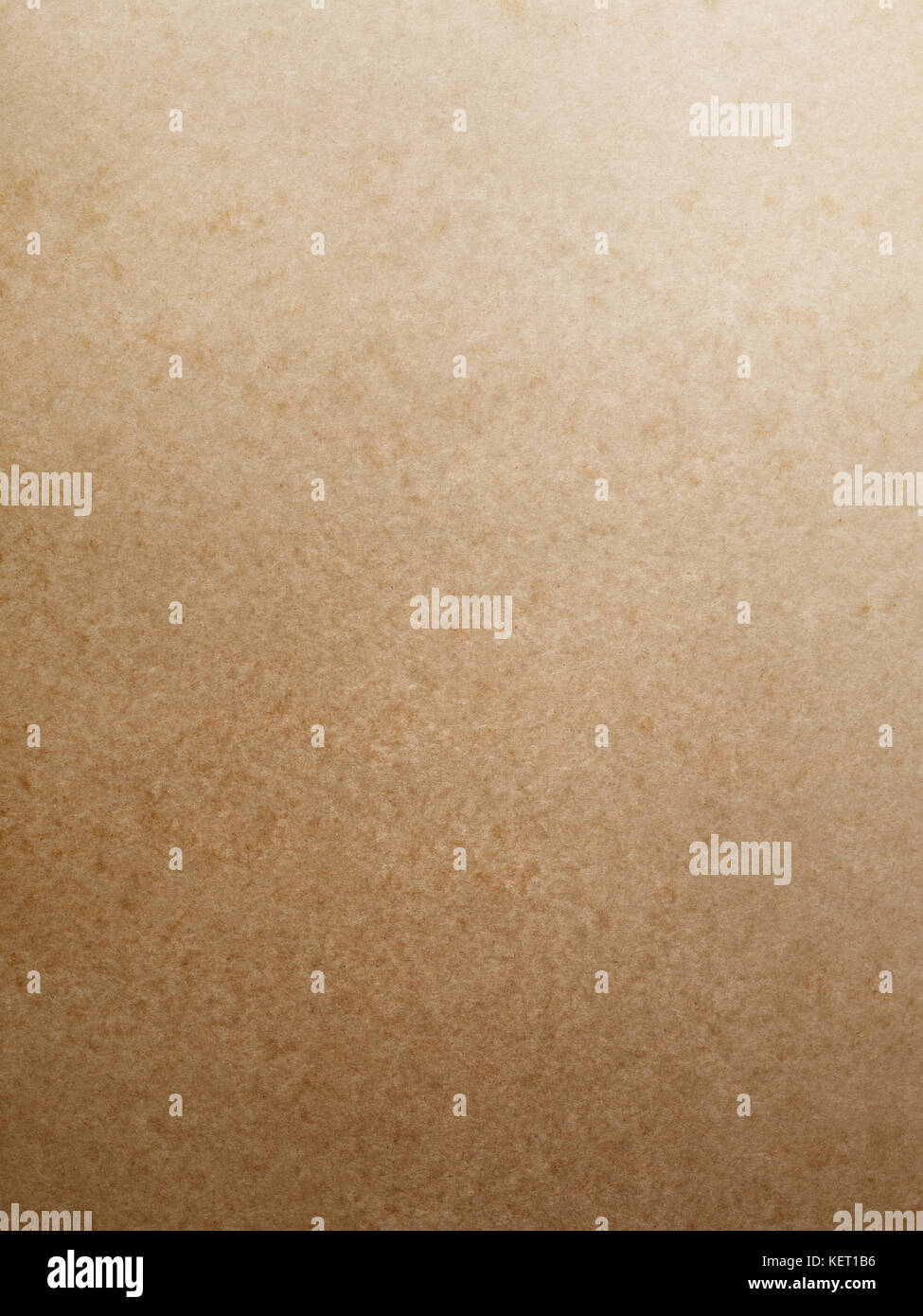 Smooth tan  brown mottled cardboard background with gradation Stock Photo