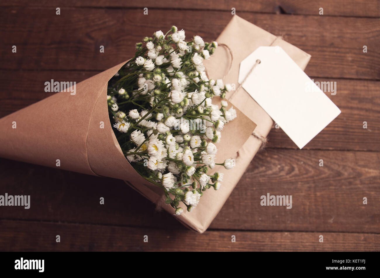 Bouquet flowers wrapped on paper hi-res stock photography and images - Alamy