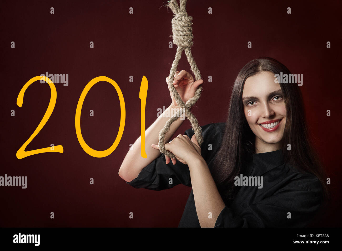 fun woman show noose with 2018 new year digits Stock Photo