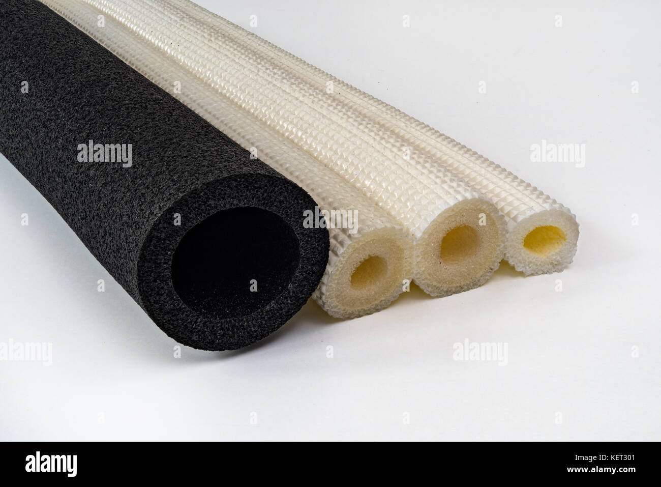Polyethylene pipe insulation different diameter and colors shockproof foam Stock Photo