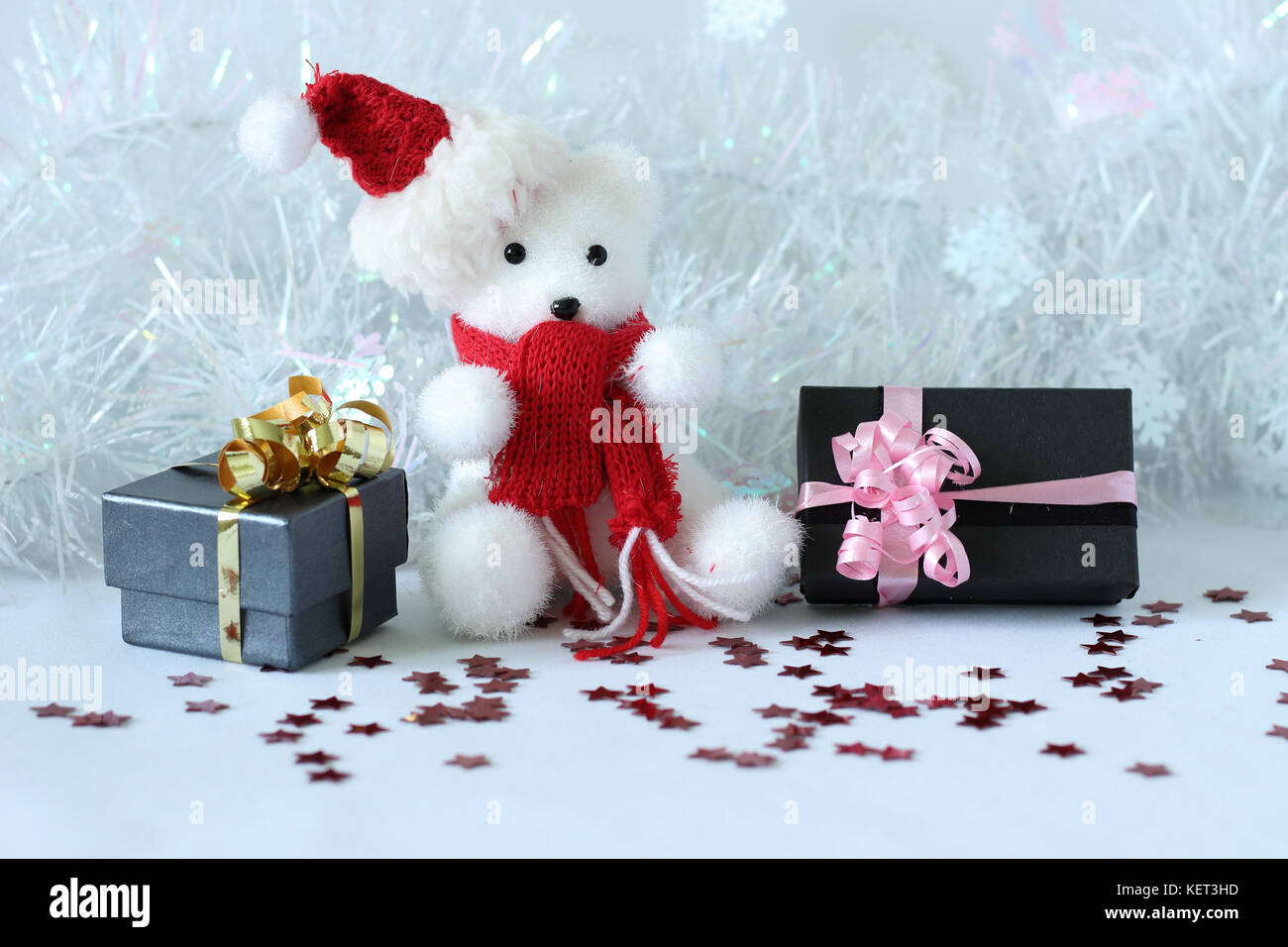 gifts with shiny bows on a Christmas party decor Stock Photo