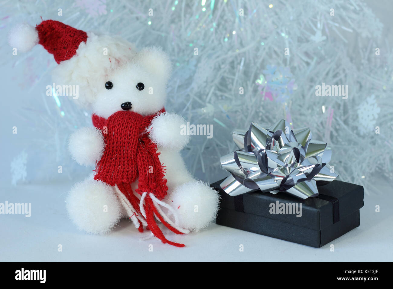 gifts with shiny bows on a Christmas party decor Stock Photo