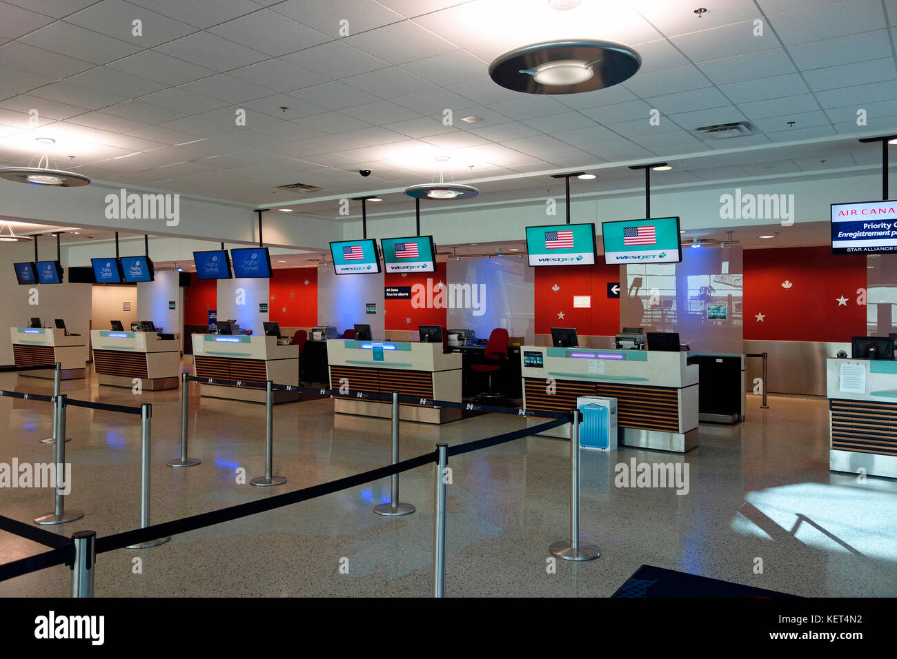 an airport airline ticket check-in counter Stock Photo