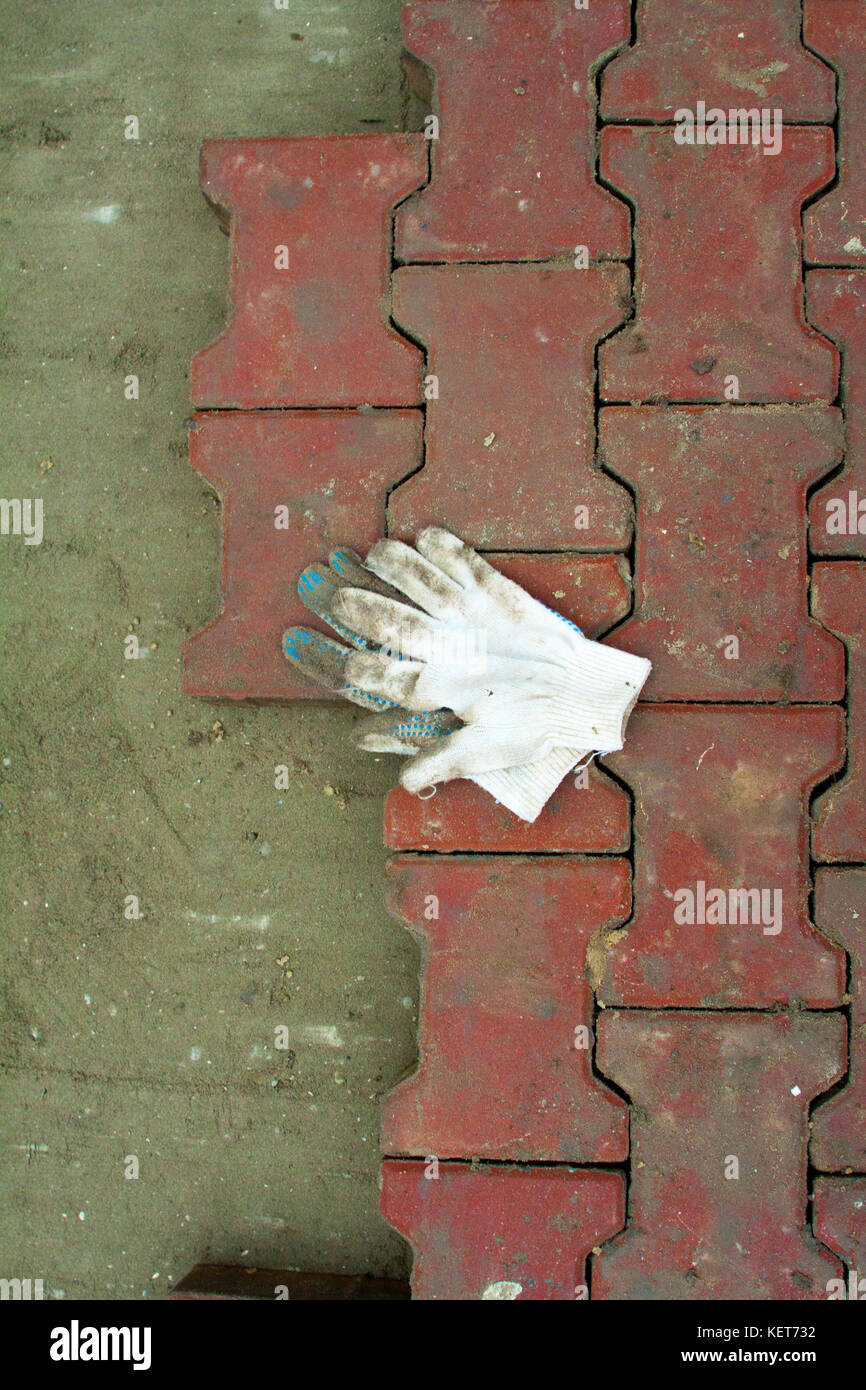 Laying Paving Slabs by mosaic closeup. Road Paving, construction
